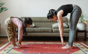 Image photo: Mother and daughter doing morning home exercise 