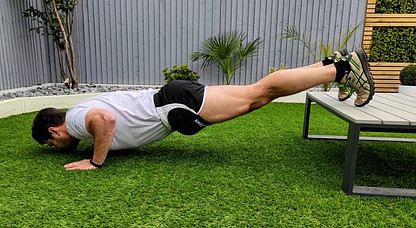 Image photo: A male trainer on a bench press workout