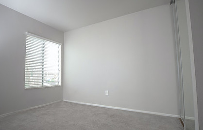 an empty room painted in white color