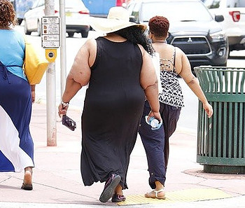 obese women walking on the street