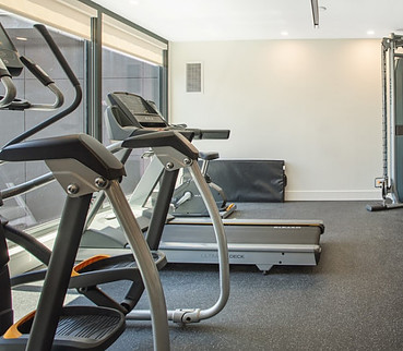 Image photo: An elliptical a treadmill and an indoor bike